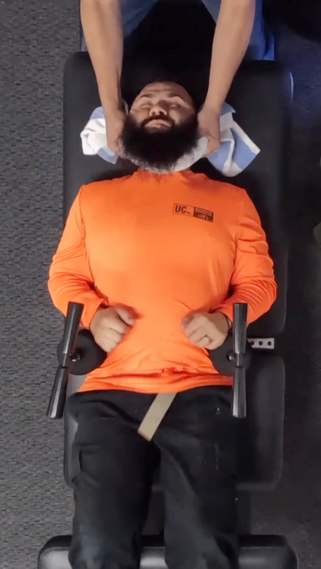 Top-down view of a patient receiving a cervical adjustment
