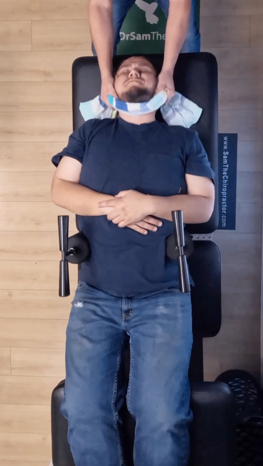 Top-down view of Dr. Sam delivering a Ring Dinger® cervical decompression