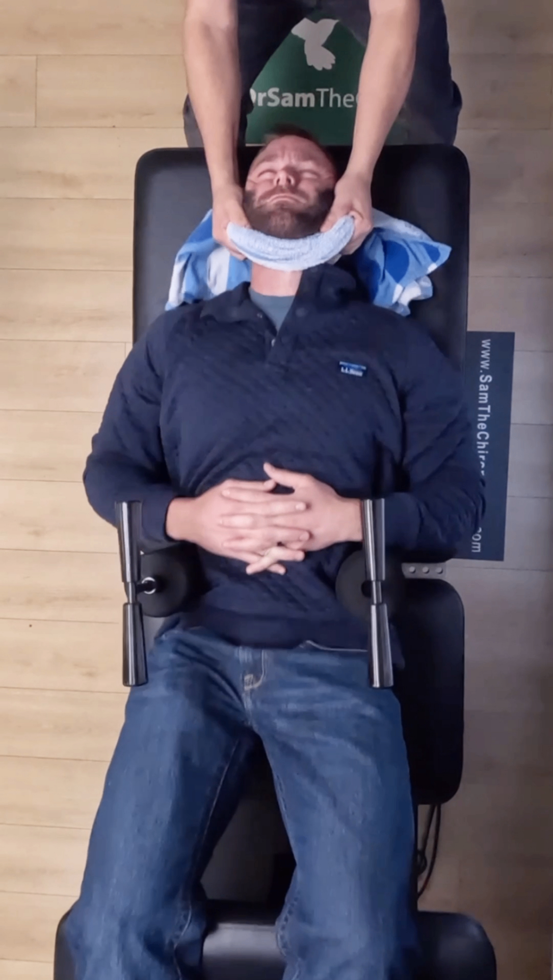 Patient on the decompression table during a Ring Dinger® session